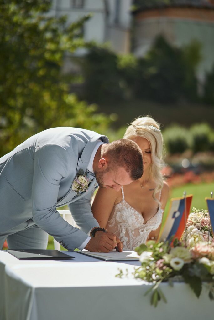 Newlyweds by Lake Bled after the ceremony