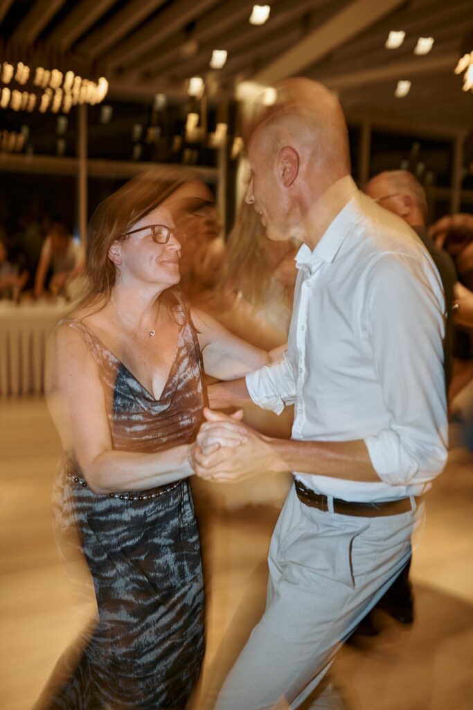 Wedding guests celebrating late at Bled Rose Hotel