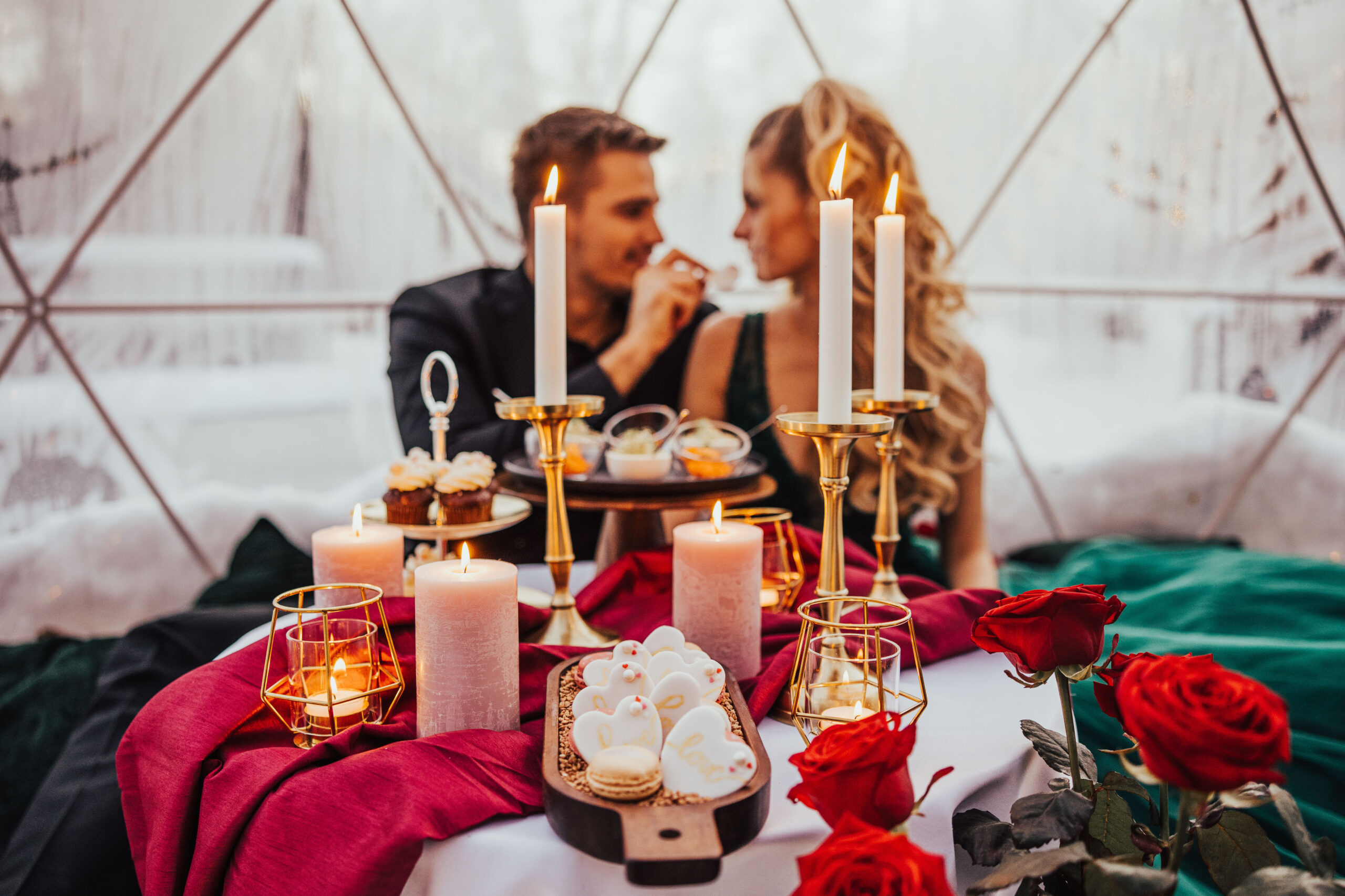 Night proposal among illuminated glass domes at Bled Rose Hotel